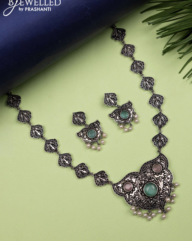 Oxidised haaram with mint green & baby pink stones and pearl hangings