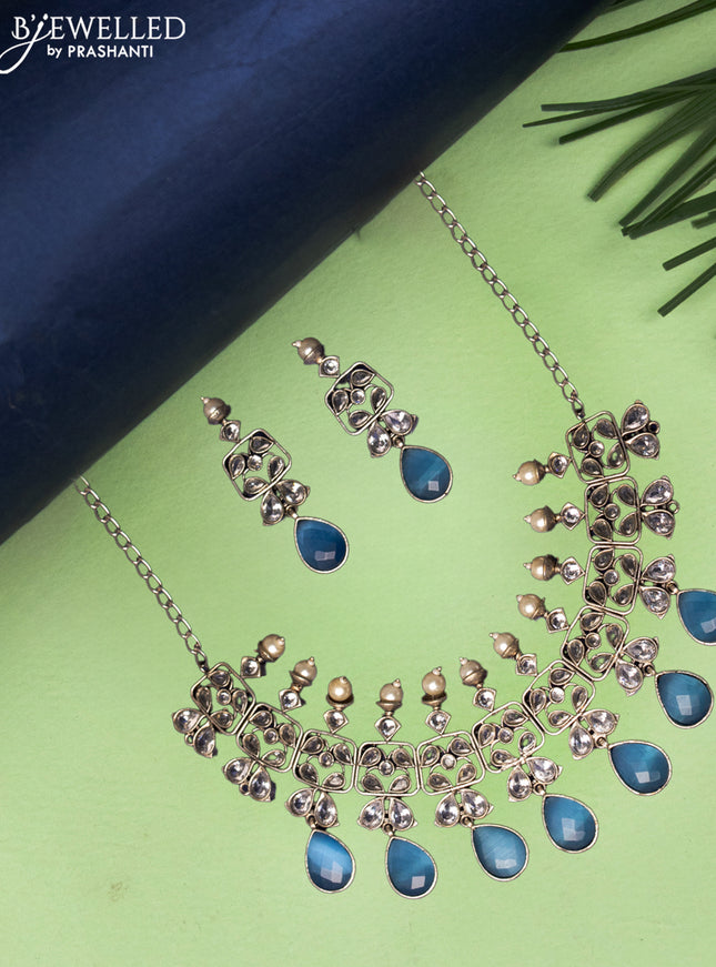Oxidised necklace with ice blue and cz stones