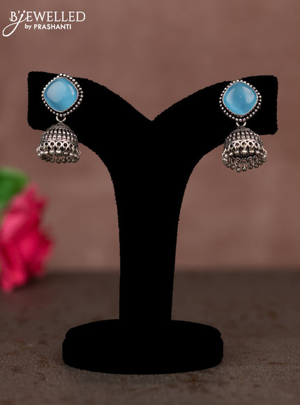 Oxidised jhumka with ice blue stones and silver beads hanging