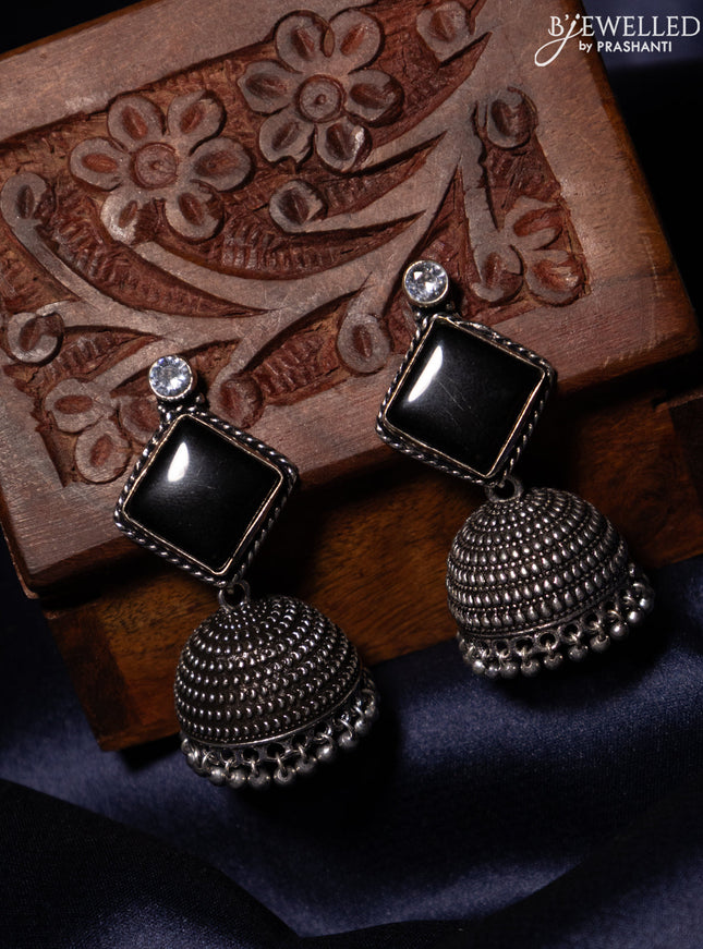 Oxidised jhumka with black & white stones and silver beads hanging