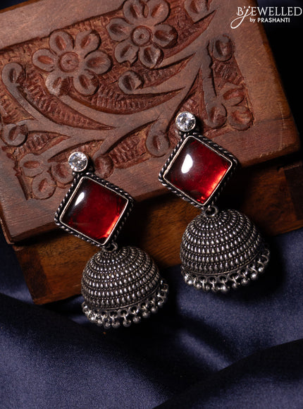 Oxidised jhumka with ruby & white stones and silver beads hanging