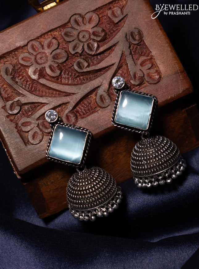 Oxidised jhumka with ice blue & white stones and silver beads hanging
