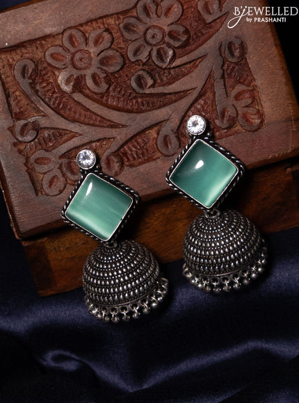 Oxidised jhumka with mint green & white stones and silver beads hanging