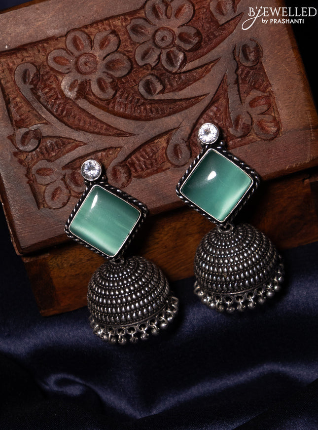 Oxidised jhumka with mint green & white stones and silver beads hanging