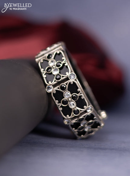 Oxidised screw type bangle with black & white stones