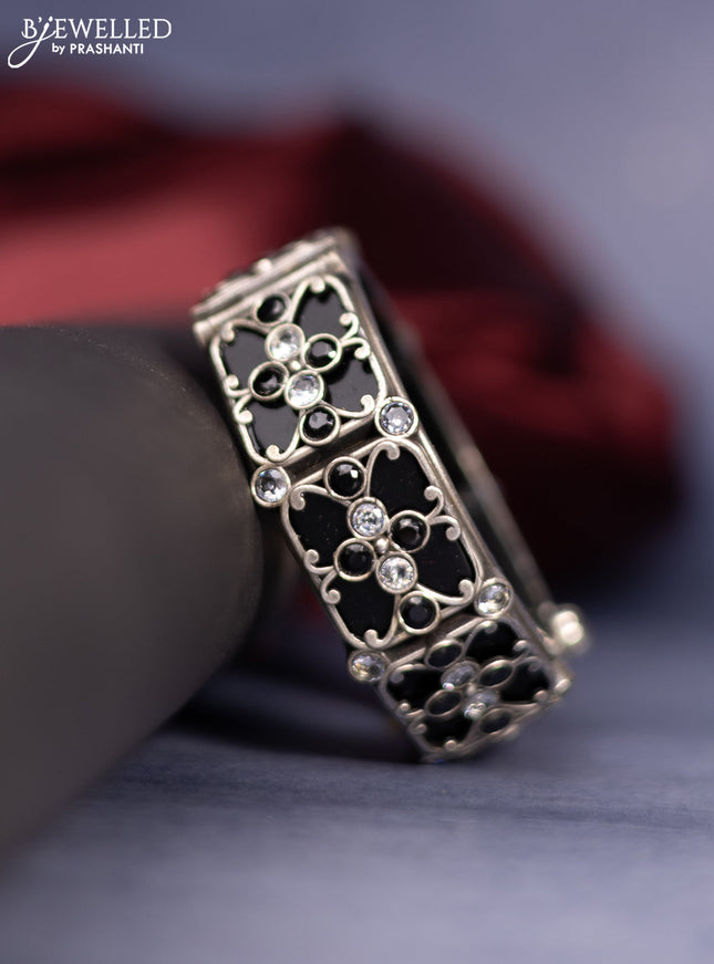 Oxidised screw type bangle with black & white stones