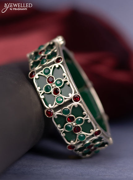 Oxidised screw type bangle with emerald and ruby stones
