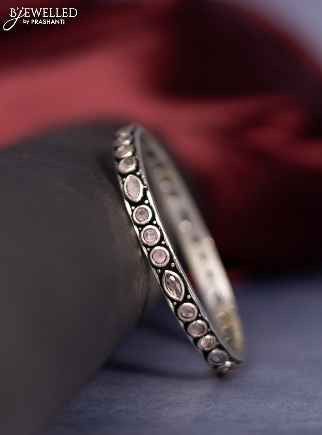 Oxidised bangle with baby pink stones