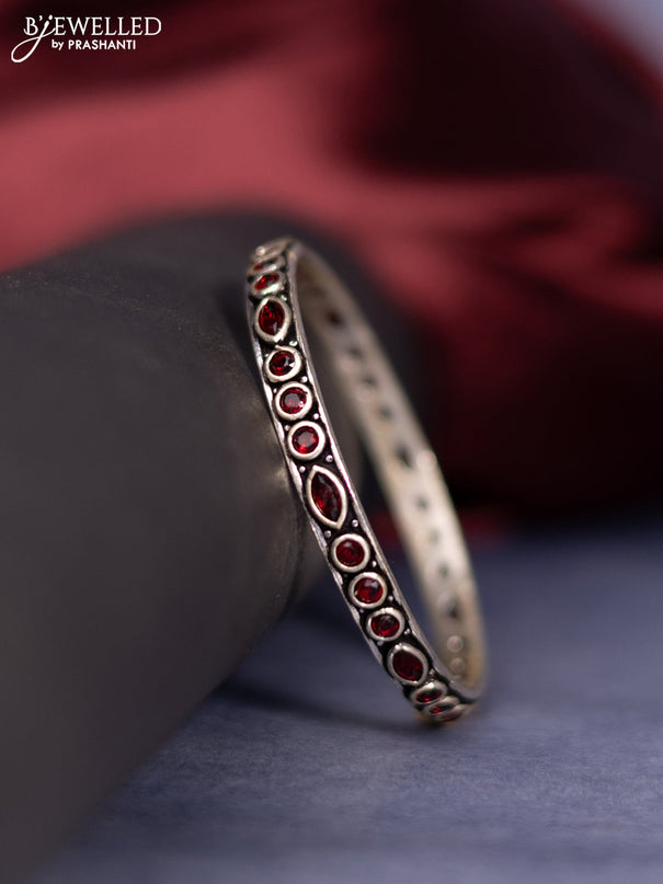Oxidised bangle with ruby stones