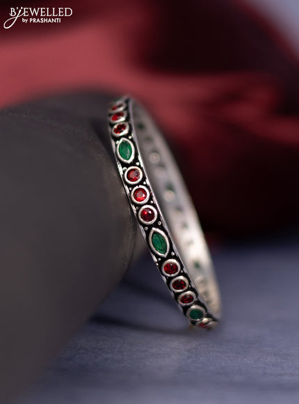 Oxidised bangle with emerald and ruby stones