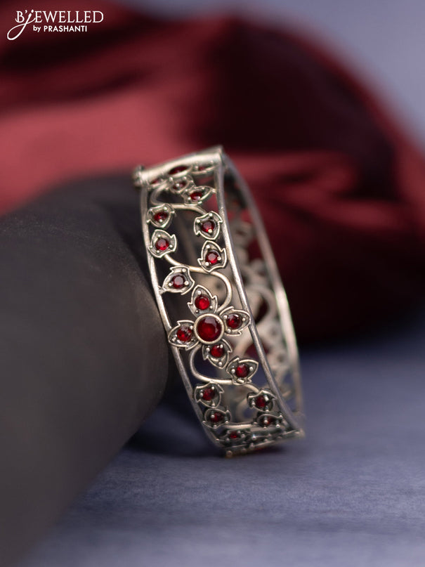 Oxidised screw type bangle with ruby stones