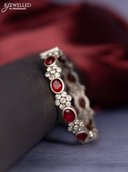 Oxidised screw type bangle with ruby and cz stones