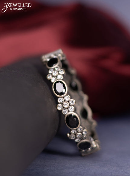 Oxidised screw type bangle with black and cz stones