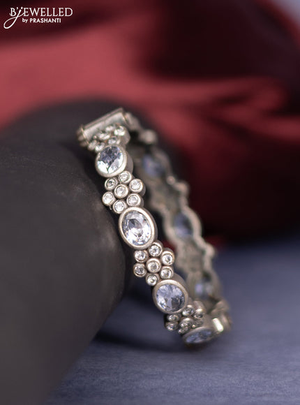 Oxidised screw type bangle with white stones