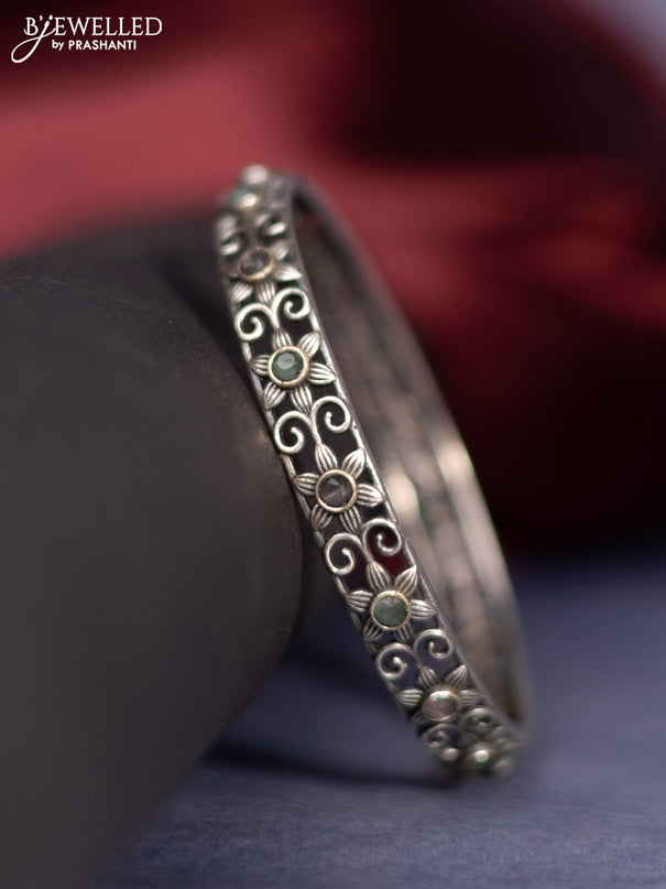 Oxidised bangle with mint green and baby pink stones