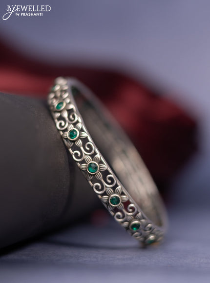Oxidised bangle with emerald stones
