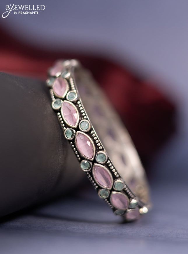 Oxidised bangle with mint green and baby pink stones