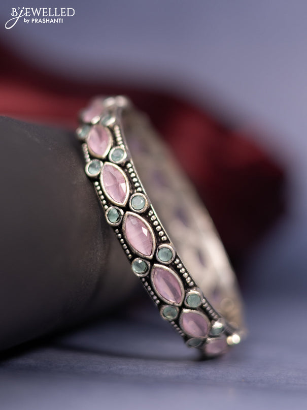 Oxidised bangle with mint green and baby pink stones
