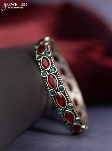 Oxidised bangle with emerald and ruby stones