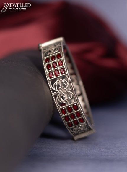 Oxidised screw type bangle with ruby stones