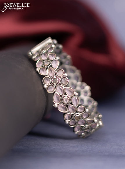 Oxidised screw type bangle with baby pink stones