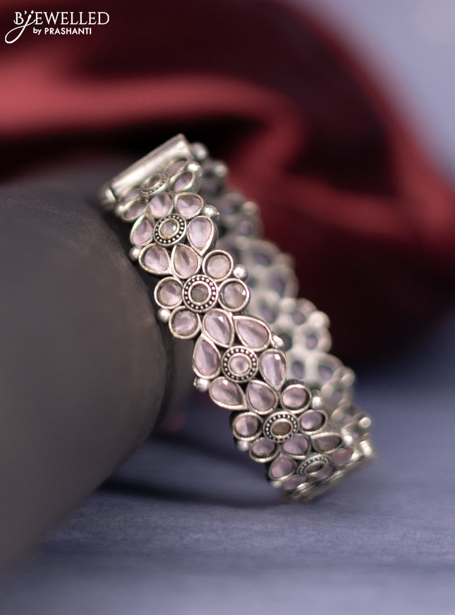 Oxidised screw type bangle with baby pink stones