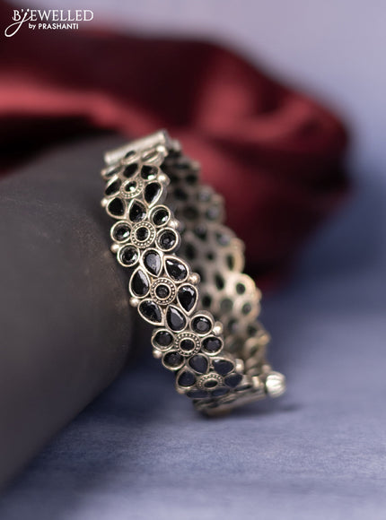 Oxidised screw type bangle with black stones
