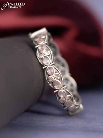 Oxidised screw type bangle with baby pink stones