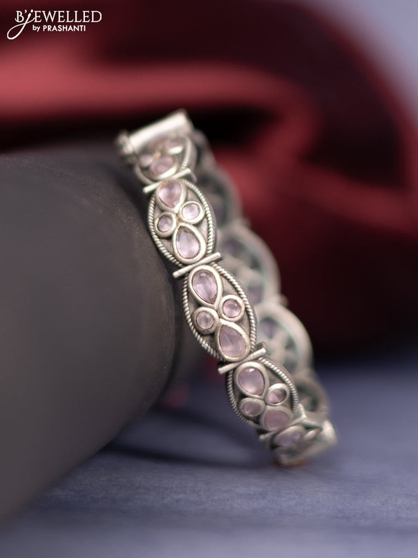 Oxidised screw type bangle with baby pink stones