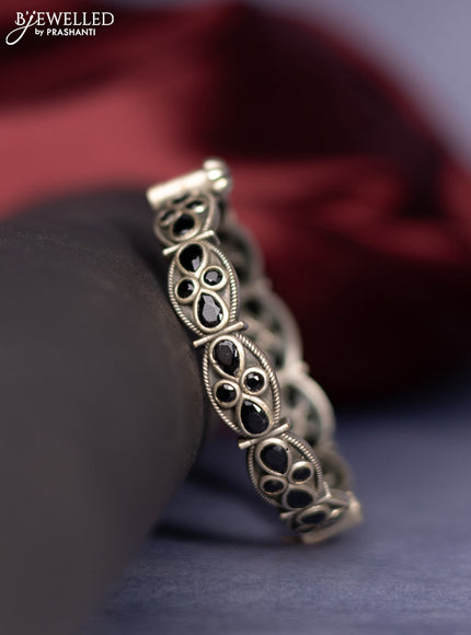 Oxidised screw type bangle with black stones