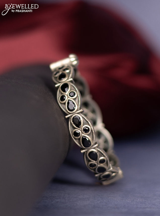 Oxidised screw type bangle with black stones
