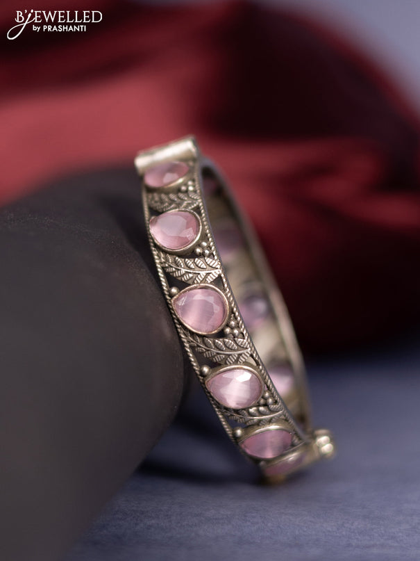 Oxidised screw type bangle with baby pink stones