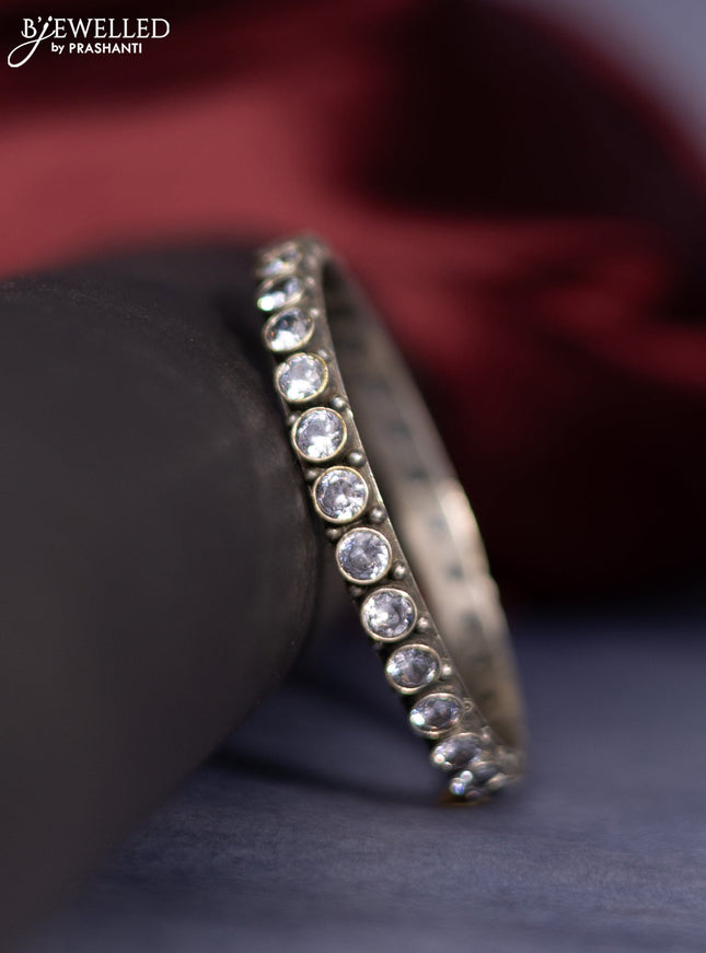 Oxidised bangle with white stones