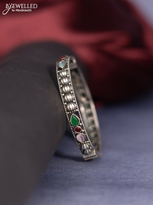 Oxidised screw type bangle with multicolour stones