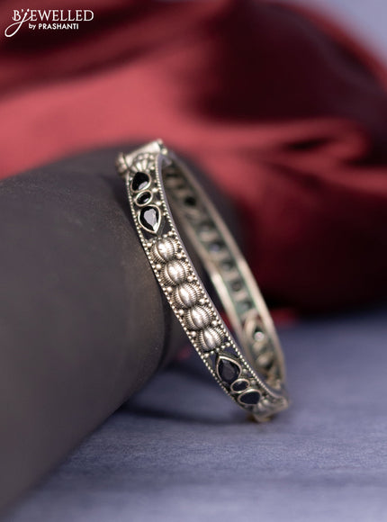 Oxidised screw type bangle with black stones