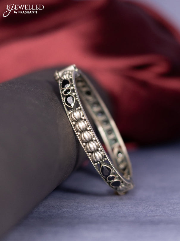 Oxidised screw type bangle with black stones