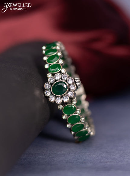 Oxidised screw type bangle with emerald stones