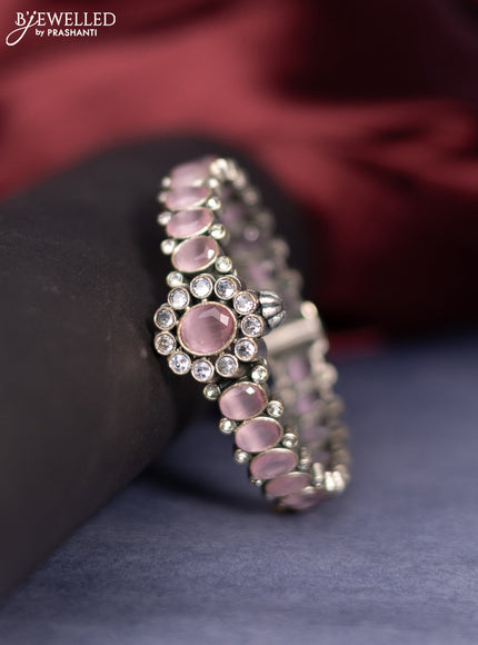 Oxidised screw type bangle with baby pink stones