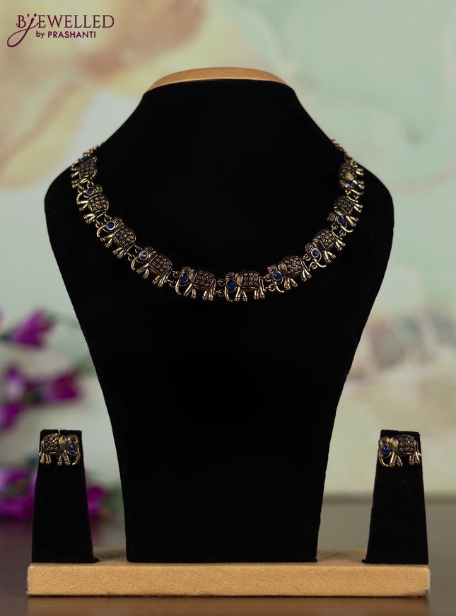 Oxidised necklace with elephant design with sapphire stones in gold finish