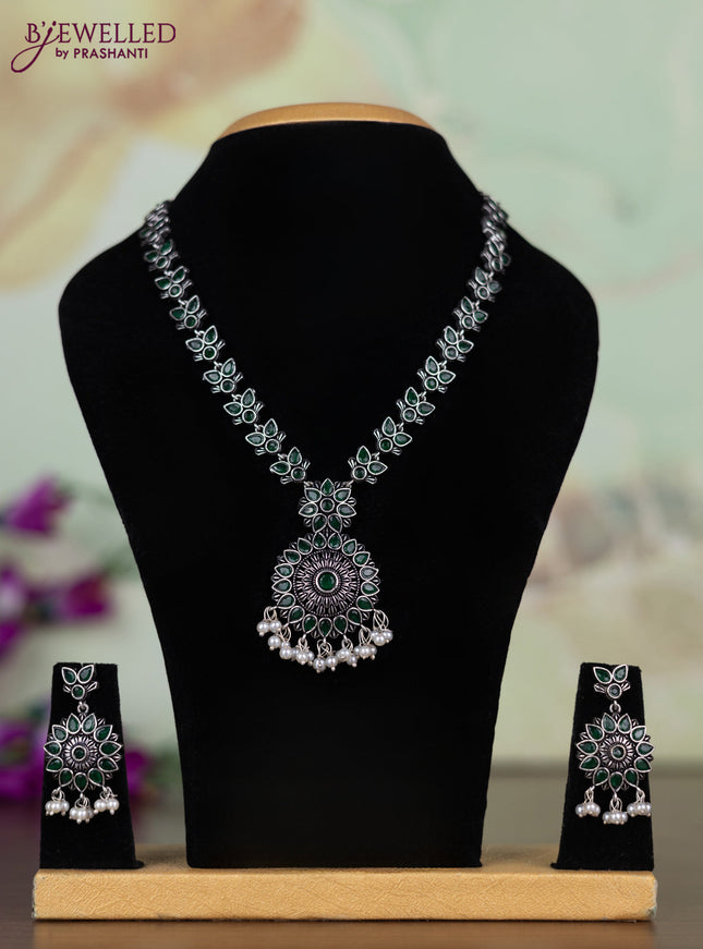 Oxidised necklace with emerald stones and pearl hangings