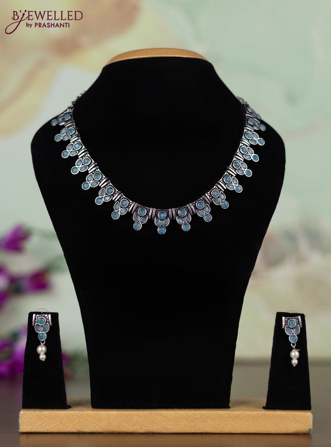 Oxidised necklace with ice blue stones