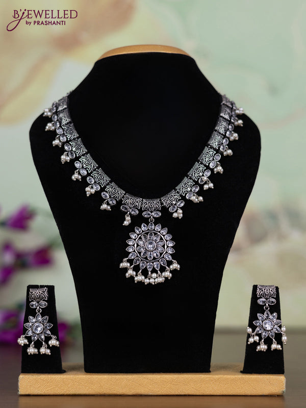 Oxidised necklace with white stones and pearl hangings