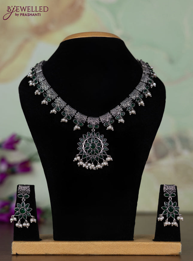 Oxidised necklace with emerald stones and pearl hangings