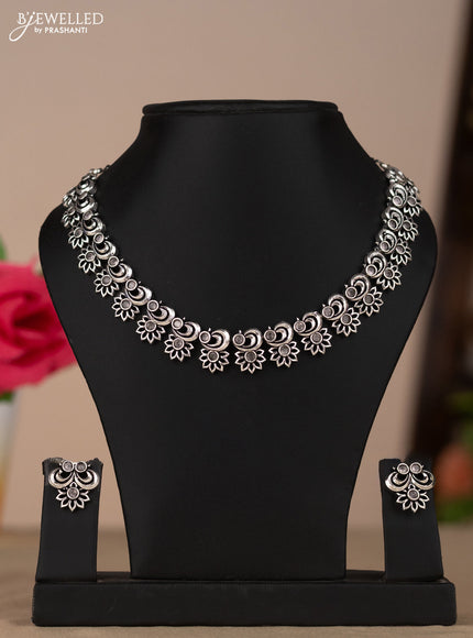 Oxidised necklace with floral design in white stones