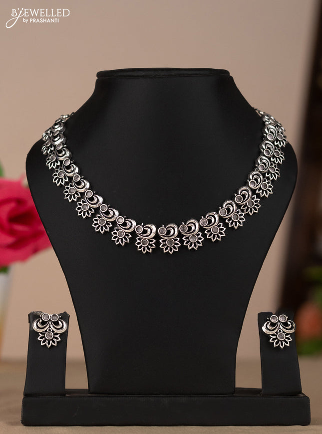 Oxidised necklace with floral design in white stones