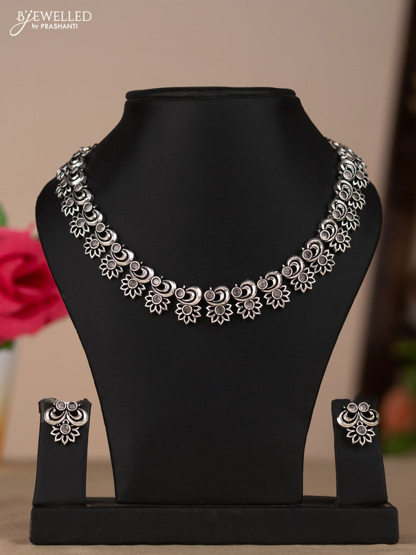 Oxidised necklace with floral design in white stones