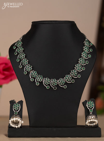 Oxidised necklace with floral design in green stones
