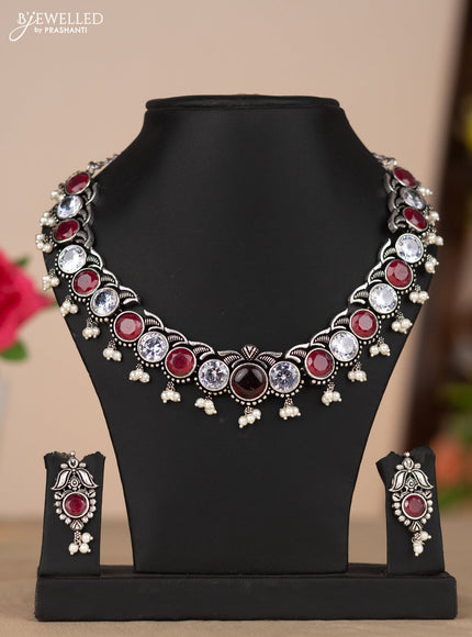 Oxidised necklace in red and white stones