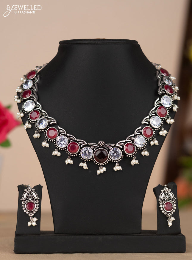 Oxidised necklace in red and white stones