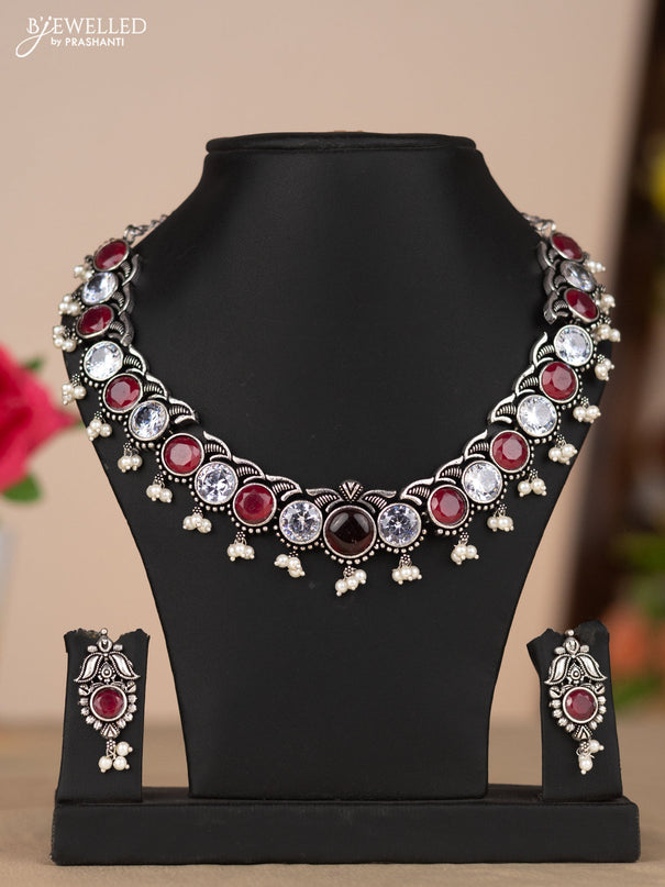Oxidised necklace in red and white stones